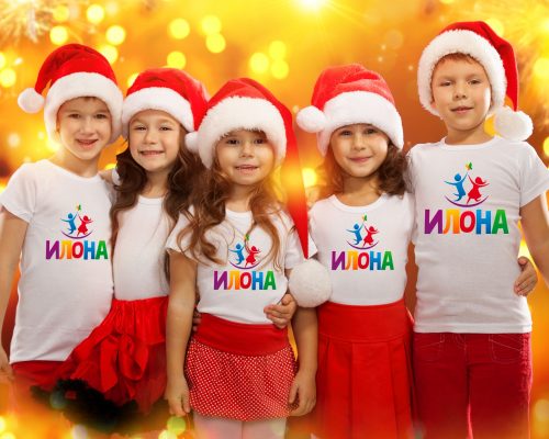 Group of happy kids in Christmas hat with colorful lights on background. Holidays, christmas, new year, x-mas concept.